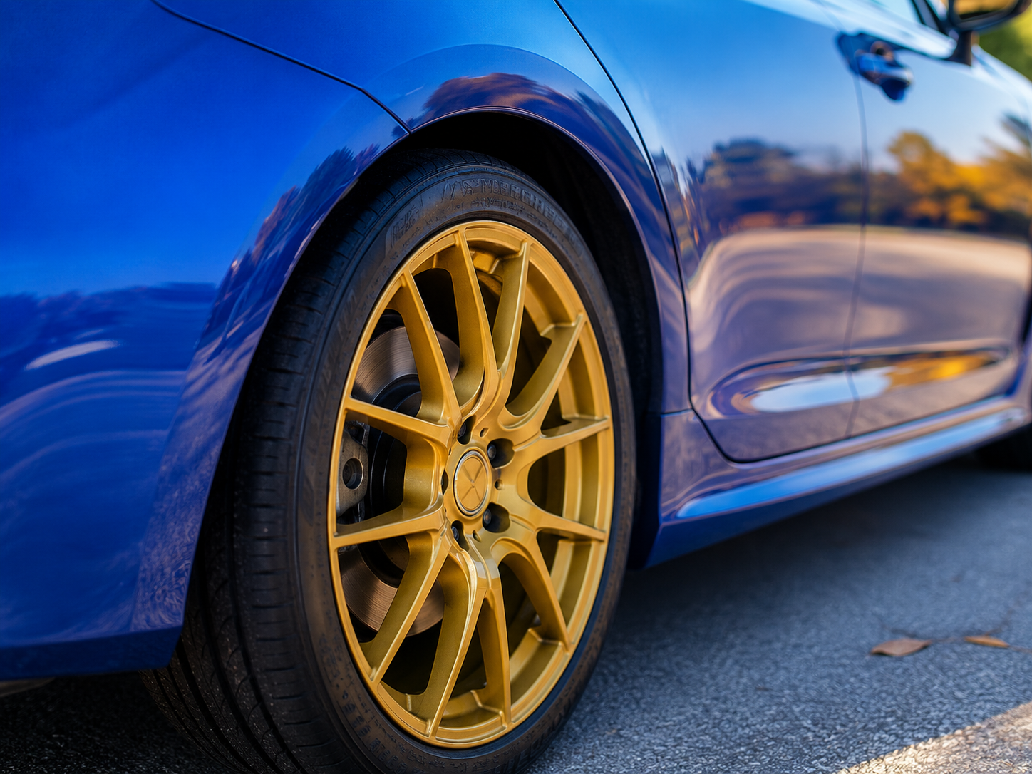 Blue vehicle finish and wheel detail